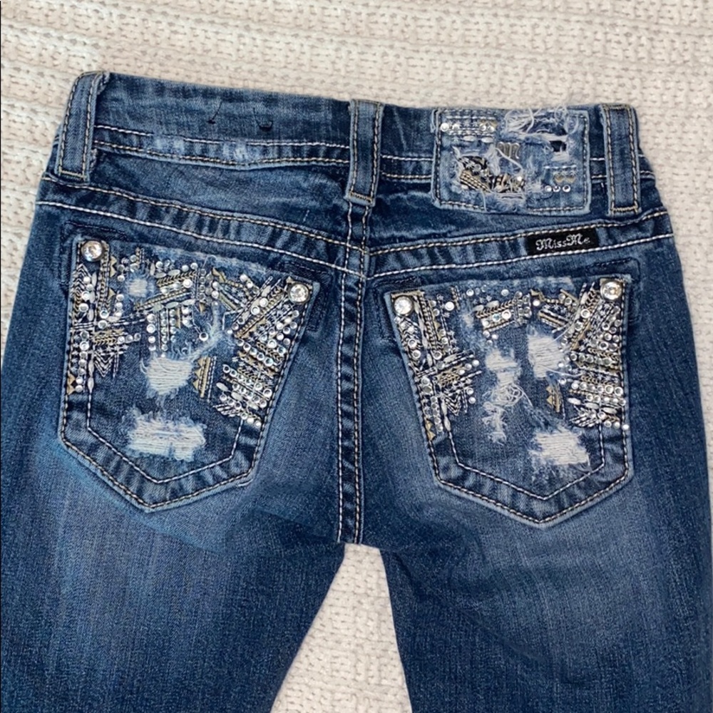 Miss Me signature boot distressed jeans